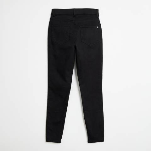 ALESIAS-Denim-ALESIA's Black Skinny Jean is the perfect addition to your denim collection. Made with high-quality denim material, these jeans are designed to provide you with both comfort and style. The black color gives them a sleek and sophisticated look that can be dressed up or down for any occasion. The skinny fit of these jeans is flattering and accentuates your curves in all the right places. The material is stretchy, allowing for a comfortable and flexible fit that moves with you throughout the day.